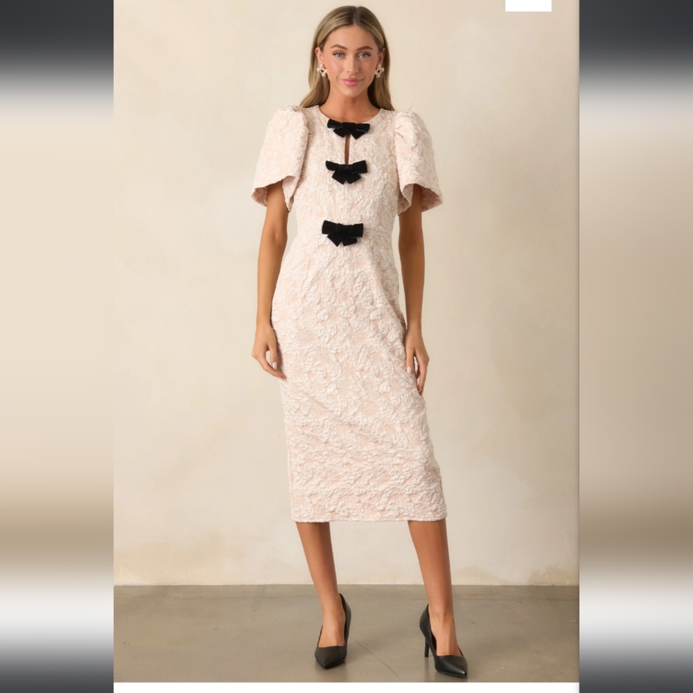 Elegant Textured Midi Dress with Black Bows